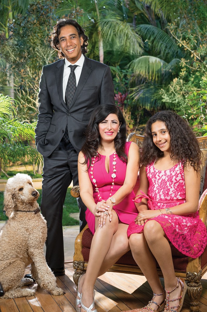Sean and Marjan Daneshmand at home in Rancho Santa Fe with daughter Natalie, and one of their two poodles