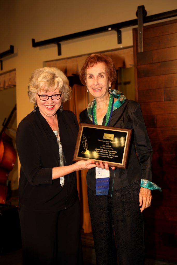 Arts & Culture Editor Darlene Davies (right) recieving the Best in Show award at the 2016 San Diego Press Club Awards